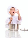 Little singing boy chef in uniform