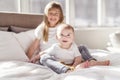 Little sister with her baby brother. Toddler kid Family with children at home. Royalty Free Stock Photo