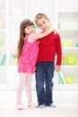 Little sister hugging her brother Royalty Free Stock Photo