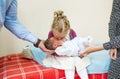 Little sister hugging and kissing her baby boy brother. Royalty Free Stock Photo