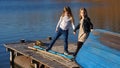 Little sisters on the pier Royalty Free Stock Photo