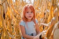 Little six year old caucasian girl on the farm. Happy cute girl