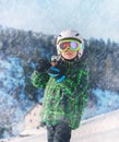 Little skier portrait in ski areal