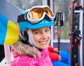 Little skier on ski lift Royalty Free Stock Photo