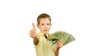 Little smiling boy holding a a stack of 100 US dollars bills and