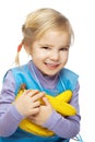 Little smiling girl with bananas Royalty Free Stock Photo