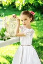 Little smiling girl with big clock. People, time management and Royalty Free Stock Photo