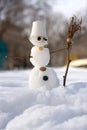Little snowman with broom Royalty Free Stock Photo