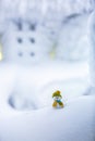 A little snowman in a hat and scarf. Royalty Free Stock Photo