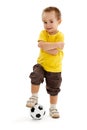 Little soccer player boy with small ball Royalty Free Stock Photo