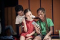 A little soccer player showing cell phone content to his teammates Royalty Free Stock Photo