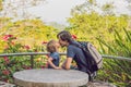 Little son kissing his father outdoors in spring park Royalty Free Stock Photo