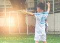 Little sport soccer boy with winning gesture after shooting a goal in a football match Royalty Free Stock Photo