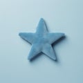 Little Star: Blue Star Shaped Toy Isolated On Blue Background