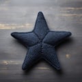 Little Star: Indigo Wool Knitted Star On Gray Floor