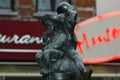 A little statue of men drinking wine Royalty Free Stock Photo