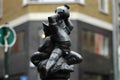 A little statue of men drinking wine Royalty Free Stock Photo