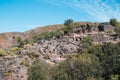 Little stone houses and white cross on a hill in Drave, Portugal Royalty Free Stock Photo