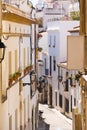 Little street of the historic city center Sitges, Barcelona, Catalunya, Spain. Vertical.