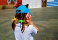 Little Stressed Girl Using Smartphone. Child Talking On Mobile Phone Outdoor. Royalty Free Stock Photo