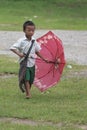 Little Student boy walking in his school.