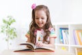 Little student girl studying at preschool Royalty Free Stock Photo