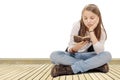 Little student girl studying and reading book at school Royalty Free Stock Photo