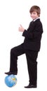 Little successful schoolboy with globe Royalty Free Stock Photo