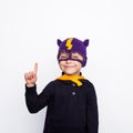 Little superhero boy pointing up Royalty Free Stock Photo