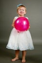 Little sweet crying girl with balloon