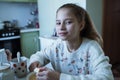 Little girl drinking tea with her grandmother Royalty Free Stock Photo