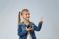 Little Teenage Girl Using Cell Smart Phone, Small Happy Smiling Child Point Finder To Copy Space Royalty Free Stock Photo