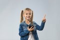 Little Teenage Girl Using Cell Smart Phone, Small Happy Smiling Child Point Finder To Copy Space Royalty Free Stock Photo
