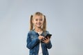 Little Teenage Girl Using Cell Smart Phone, Small Kid Happy Smiling Child Royalty Free Stock Photo