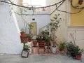 Little terrace with chairs and plantpots on the streets of Alicante