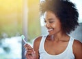 This little thing keeps my teeth healthy...a young woman brushing her teeth in the bathroom. Royalty Free Stock Photo