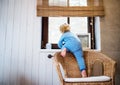 Toddler boy in a dangerous situation at home. Royalty Free Stock Photo