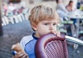 Little toddler boy eating ice cream in cone Royalty Free Stock Photo