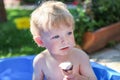 Little toddler boy eating ice cream in cone Royalty Free Stock Photo