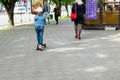 Little toddler boy of 3 years having fun on his bicycle in summer, outdoors