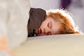 Little toddler child resting on say in parents bed. Adorable kid boy sleeping and dreaming. Peaceful and relaxed rest Royalty Free Stock Photo