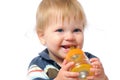 Little toddler drinks water from bottle Royalty Free Stock Photo