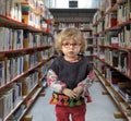 Little toddler in a public library Royalty Free Stock Photo