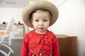 Little toddler with summer straw hat