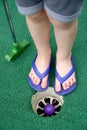 Little toes and miniature golf Royalty Free Stock Photo