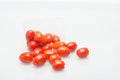 Little tomatoes in white background Royalty Free Stock Photo