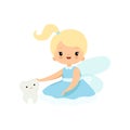 Little Tooth Fairy Sitting with Baby Tooth, Adorable Blonde Fairy Girl Cartoon Character in Light Blue Dress with Wings