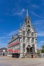 Little towers and red shutters on the historic town hall in Gouda