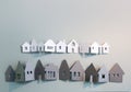 Little town houses in row. Property and house buying concept. Paper cut design background. Paper cut design background. Royalty Free Stock Photo