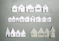 Little town houses in row. Property and house buying concept. Paper cut design background. Paper cut design background. Royalty Free Stock Photo